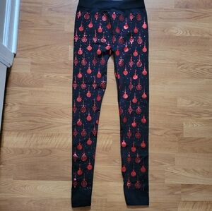 Leggings Fleeced lined size Women's S/M Black with Red Ornaments. Never worn.